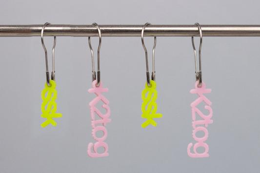 Lazadas: Maschenmarkierer (k2tog-ssk grün.rosa)