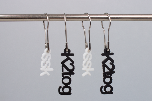 Lazadas: Maschenmarkierer (k2tog-ssk schwarz.weiß)